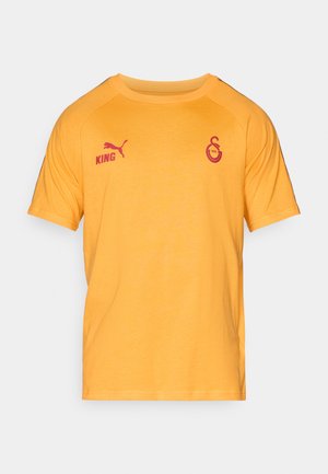 Yellow short-sleeve t-shirt made of cotton. Features red "KING" and logo on left chest. Smooth texture with a classic crew neck design.