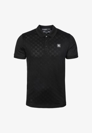 Camisa de polo negra hecha de una tela suave, con un sutil patrón en relieve, tapeta de dos botones y logotipo en el lado izquierdo del pecho.