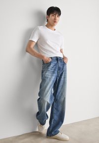 G-STAR TYPE - Løst sittende jeans - antique faded penida blue