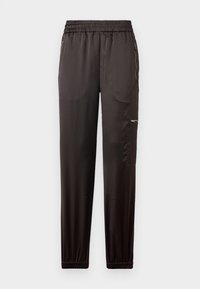 Black athletic pants made of smooth fabric, featuring an elastic waistband, tapered legs, and zippered side pockets.