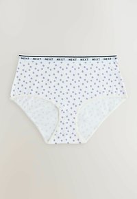 Weiße Slips mit hoher Taille mit kleinen lila Punkten und einem elastischen Bund mit der Aufschrift „NEXT“ in schwarzem Text.