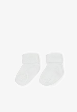 Weisse Baumwollbabysocken mit einem gerippten Bündchen; weiche Textur, runder Zehenbereich und nahtloses Design für optimalen Komfort.