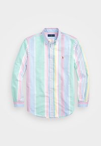 Pitkähihaista nappipaitaa, jossa on pystysuorat vaaleat raidat sinisestä, vaaleanpunaisesta, vihreästä, keltaisesta ja valkoisesta, ja siinä on pieni brodeerattu logo rinnassa.