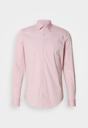 Světle růžová košile na knoflíky s jemným proužkovaným vzorem, dlouhými rukávy, rozloženým límcem a zaobleným lemem. Obsahuje krémové knoflíky.