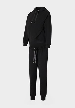 Felpa nera per gravidanza con design a wrap, cordini regolabili e pantaloni abbinati con vita elastica e polsini.