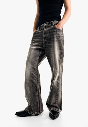 Bershka Traperice krojene za nošenje s čizmama - mottled dark grey