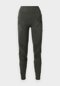 Leggings verde scuro realizzati in tessuto elasticizzato, caratterizzati da motivi testurizzati e cuciture dettagliate lungo i lati e le caviglie, con vita alta.