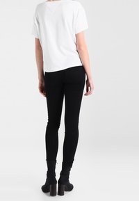 Tommy Jeans T-shirt med print - white