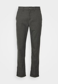 Dark gray tailored pants in a textured fabric, featuring a button closure, side pockets, and rolled cuffs at the hem.