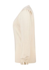 Lichtbeige trui met lange, licht opgeblazen mouwen, geribbelde manchetten en een gladde, gestructureerde afwerking. Heeft een klassieke, ontspannen silhouet.