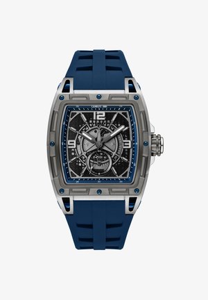Orologio quadrato con cassa in acciaio inossidabile, cinturino in gomma blu, quadrante nero dettagliato, grandi numeri bianchi e vari sottodial.
