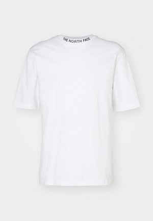 White cotton t-shirt with short sleeves and a round neck. Features black “THE NORTH FACE” text stitched at the back neckline.