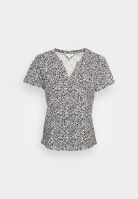 Camicetta avvolgente a maniche corte bianco e nera con scollatura a V, realizzata in un tessuto leggero e testurizzato, con una silhouette aderente.