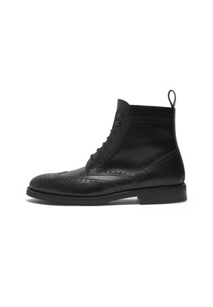 Schnürstiefelette - schwarz