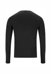 Zwarte langslavige shirt gemaakt van gladde, lichte stof. Heeft een ronde halslijn en een getailleerde pasvorm, met minimale zichtbare stiksels.