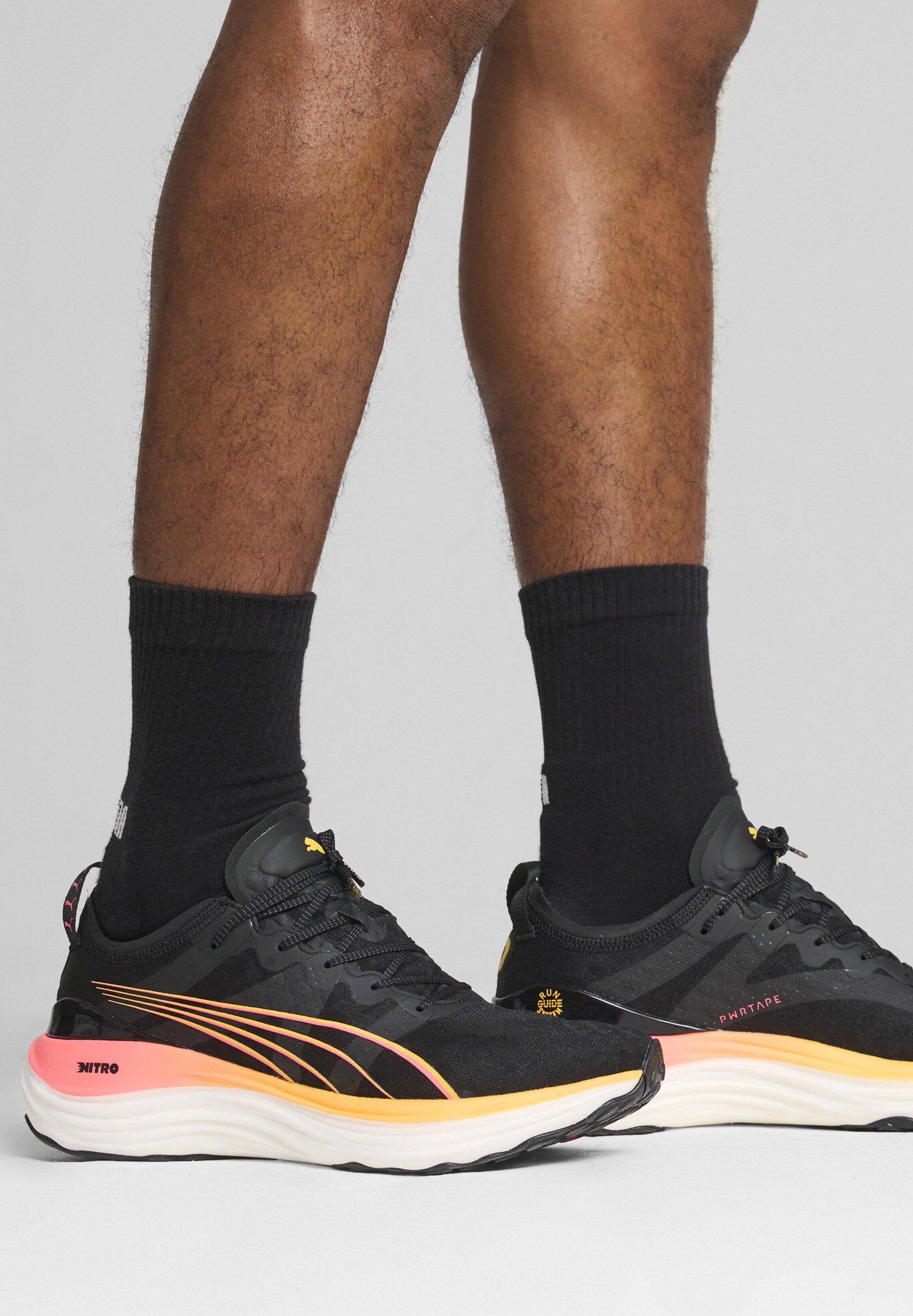 Puma FOREVERRUN NITRO - Road running shoes - black sun stream 