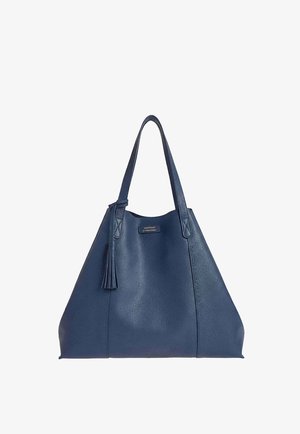 Sac cabas en cuir bleu marine avec double bandoulière, un détail pompon et une petite étiquette logo rectangulaire à l'avant.