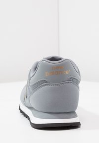 New Balance GW500 - Joggesko - grey/gold
