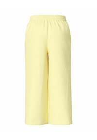Pantalon jaune à jambes larges avec une ceinture élastique et un tissu texturé, présenté sur un fond blanc.