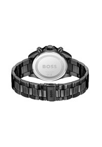 Schwarze Edelstahl-Uhr mit breiter Armbandi, ausgestattet mit einem silbernen Rückdeckel, zwei Drückern und Textdetails. Wasserdicht bis 5 Bar.