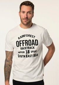 White cotton t-shirt featuring bold black text: "RAINFOREST OFFROAD RACETRACK MOTOR 18 SPORTS SOUTH EAST ASIA." Short sleeves, standard fit.