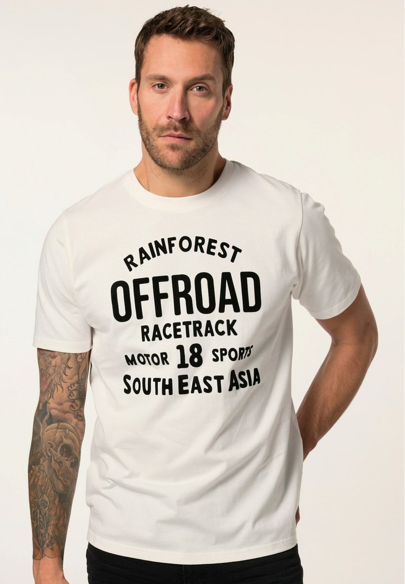 White cotton t-shirt featuring bold black text: "RAINFOREST OFFROAD RACETRACK MOTOR 18 SPORTS SOUTH EAST ASIA." Short sleeves, standard fit.