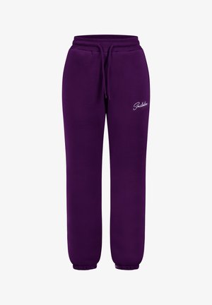 Pantaloni sportivi viola realizzati in un morbido tessuto testurizzato. Presentano una vita elastica con cordino e polsini a coste. Include un piccolo logo bianco.