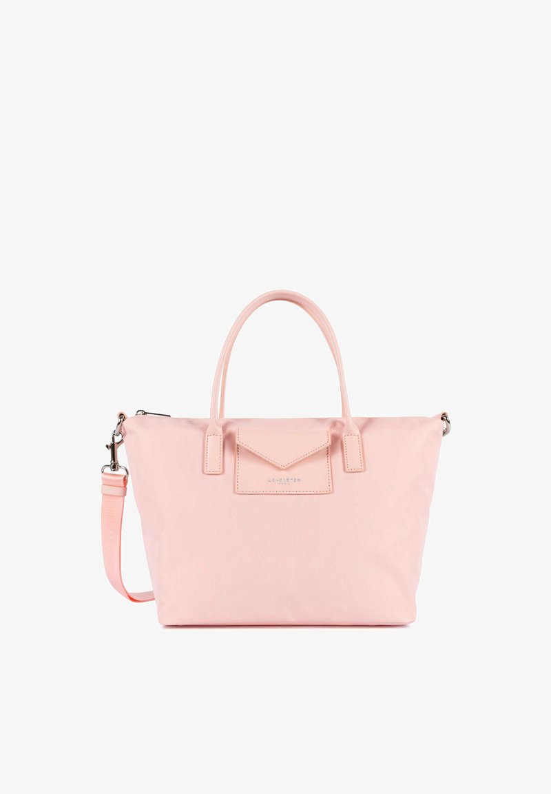 Grand sac cabas rose clair avec doubles poignées supérieures, une bandoulière amovible et une poche avant avec fermeture à rabat.