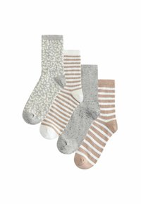 Set van vier sokken: één met een grijs dierenprint, één grijs met zwarte stippen, en twee met afwisselende strepen in beige en wit.
