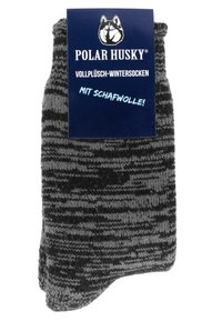 Grau und schwarz gestreifte Wintersocken aus Plüschmaterial, ausgestattet mit einem Wollmix für Wärme, mit einem Etikett, das "Polar Husky" zeigt.