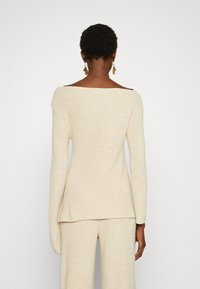 Cult Gaia Stickad tröja - beige