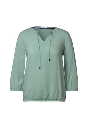 Lichtgroene blouse met een V-hals en trekkoord. Driekwart mouwen met elastische manchetten. Glad textuur en een relaxte pasvorm.