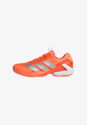 Orange athletic shoe with silver three-stripe design, mesh upper, textured finish, and a white heel accent. Lightweight and streamlined shape.