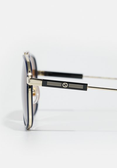 Gucci UNISEX - Lunettes de soleil - gold-coloured/brown