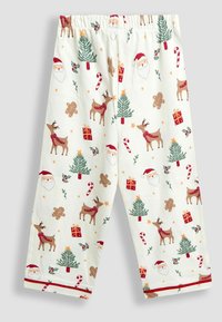 Pantalones de pijama blancos con un estampado navideño que incluye a Santa Claus, renos, árboles, hombres de jengibre, regalos y bastones de caramelo. Cintura elástica.