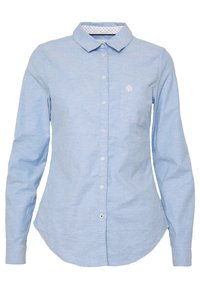 Camicia button-up azzurro chiaro con maniche lunghe, colletto, taschino sul lato sinistro e motivo a pois sul colletto interno. Tessuto dalla consistenza liscia.