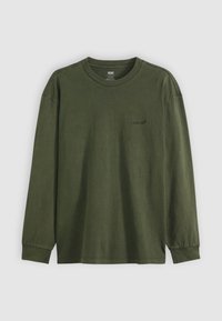 Langsluitende, ronde hals t-shirt met lange mouwen van donkergroen katoen. Bevat een klein zwart logo op de borst en ribgebreide manchetten. Glad textuur.