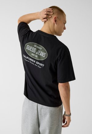 Guess, BOXY T-SHIRT - Majica kratkih rukava s printom - schwarz