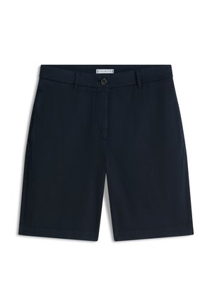 Marineblå skræddersyede shorts med bæltestropper, knaplukning foran og sidelommer, vist mod en hvid baggrund.