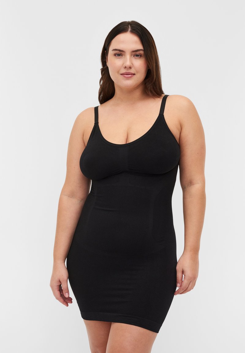 Zwarte bodycon jurk met dunne verstelbare bandjes, voorzien van een gladde ribstructuur en een aansluitende pasvorm, ontworpen voor comfort en ondersteuning.