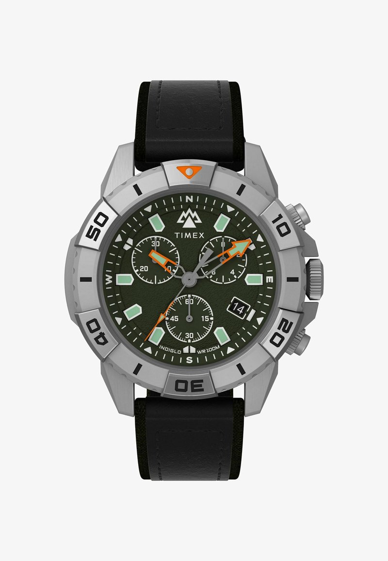 Hõbedatooni Timexi kell rohelise tekstuuri dial'iga, oranžide aksentidega, musta nahkrihmaga ja kronograafi aladialoogide kogumiga. Veekindel 100m sügavusele.