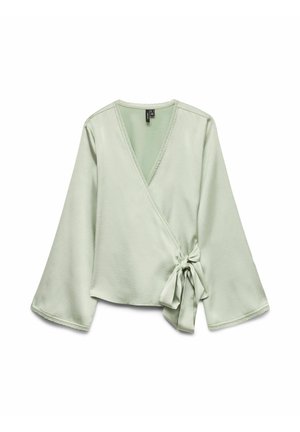 Top avvolgente verde chiaro con maniche lunghe; presenta una chiusura a fiocco sul lato e un bordo in pizzo lungo il collo. Tessuto liscio e morbido.