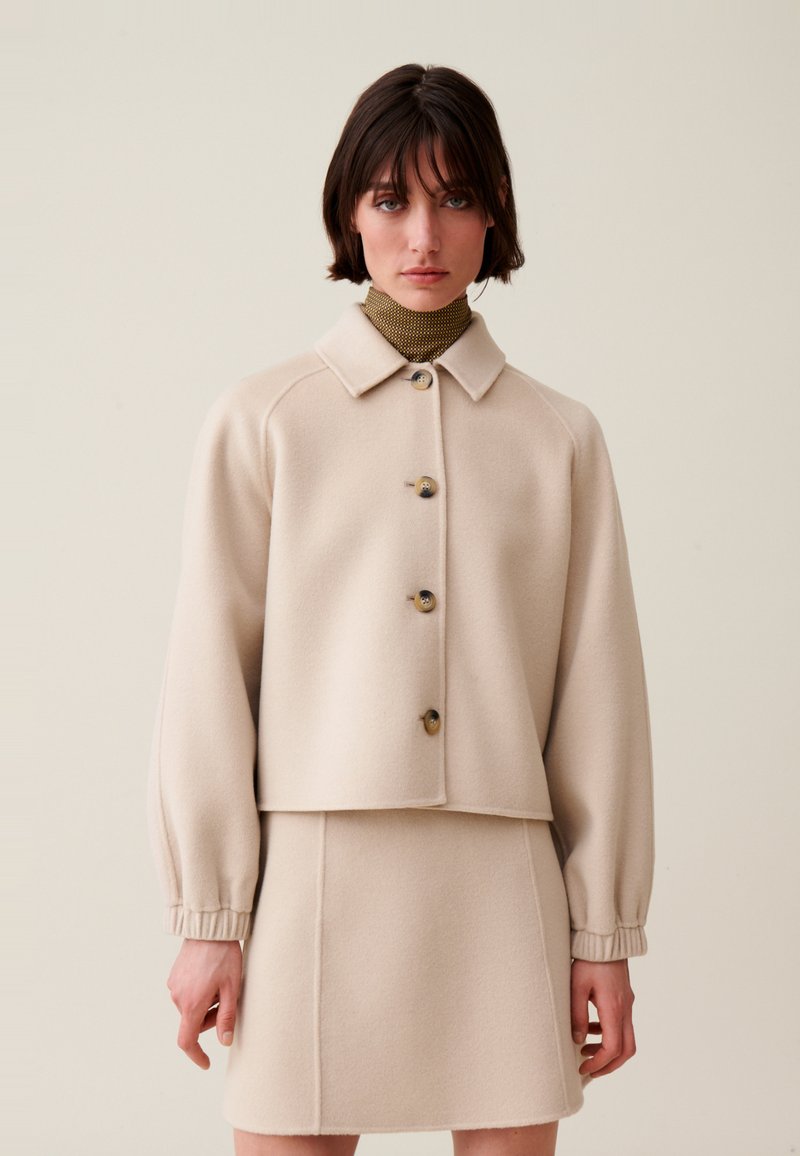Claudie Pierlot Chaqueta de entretiempo - beige