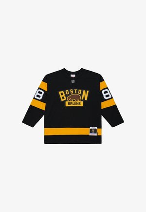 Maglia da hockey nera dei Boston Bruins con strisce gialle, numero 88 sulle maniche e un logo dell'orso sul petto.