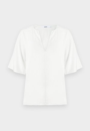 Weiße Bluse mit V-Ausschnitt und breiten kurzen Ärmeln. Hergestellt aus leichtem Stoff, zeichnet sich durch eine einfache, glatte Textur ohne sichtbare Muster aus.