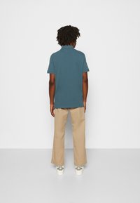 Tommy Hilfiger Polo - mercury marine
