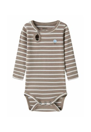 Body bébé à manches longues beige et blanc rayé avec des boutons-pression au niveau du cou et de l'entrejambe, avec un petit motif visage bleu sur la poitrine.