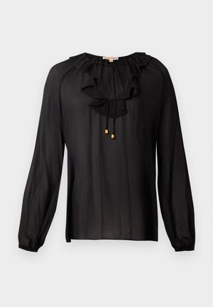 Svart bluse laget av lett stoff, med en rynket halslinning, lange ermer med elastiske mansjetter og gullakenter på snorene.