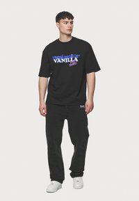 Pegador VALMAR BAGGY - Baggy Jeans - washed black
