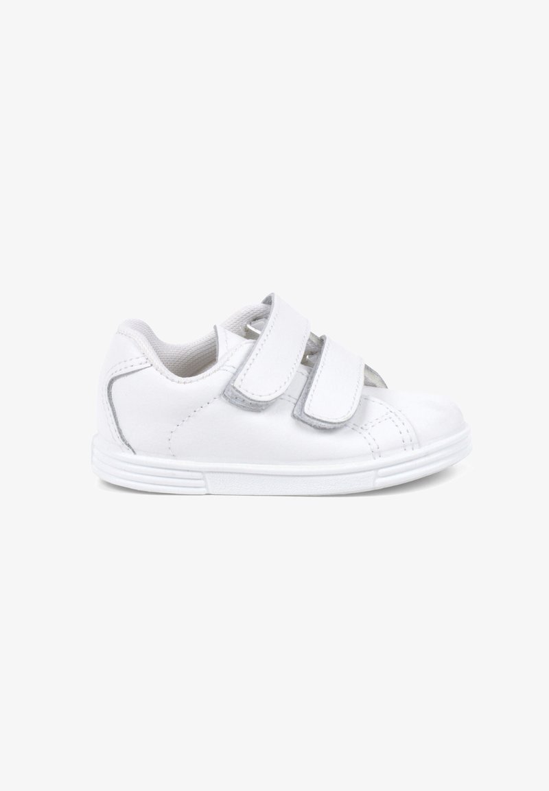 Valged tennisetaldrikud, millel on kaks Velcro rihma, valmistatud siledast sünteetilisest materjalist, ümar toe ja tekstureeritud kummist tallaga.